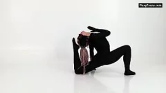 Latex-Clad Gymnast Lola Kauchuk Showcases Flexibility and Hottest Ass
